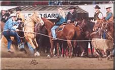 Biebers Oakie winning 2nd place in the calf roping